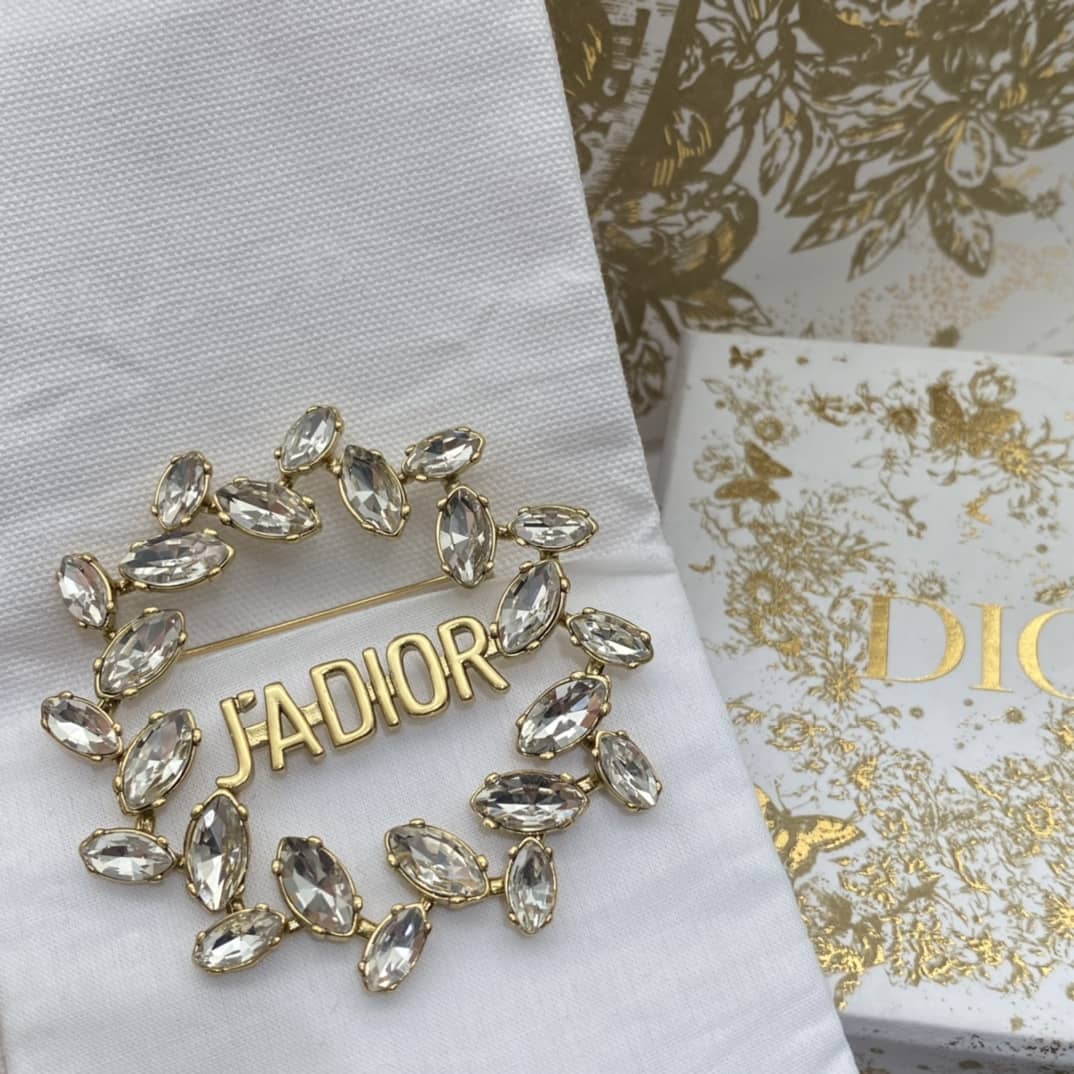 7 Star Chr1st1an D10r Brooch