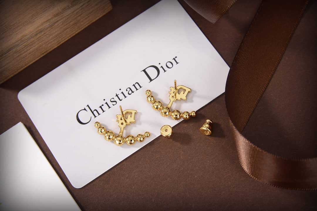 7 Star Chr1st1an D10r Earring