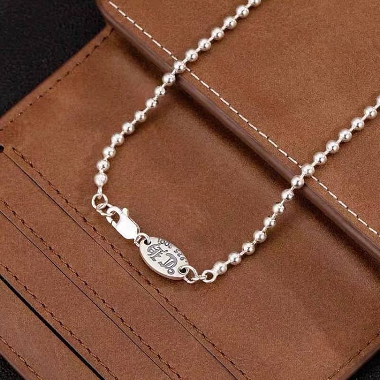 Knockoff Ch*0me He**ts Logo Necklace