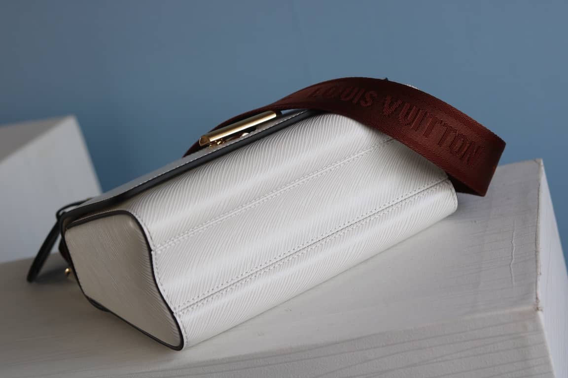 L0vis Vvtt0n Textured Epi Leather Twist Series Bag