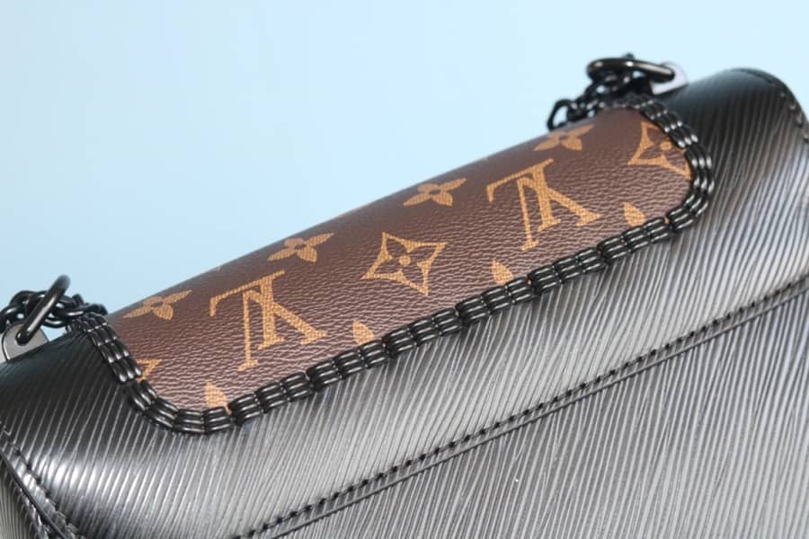 L0vis Vvtt0n Textured Epi Leather Twist Series Bag