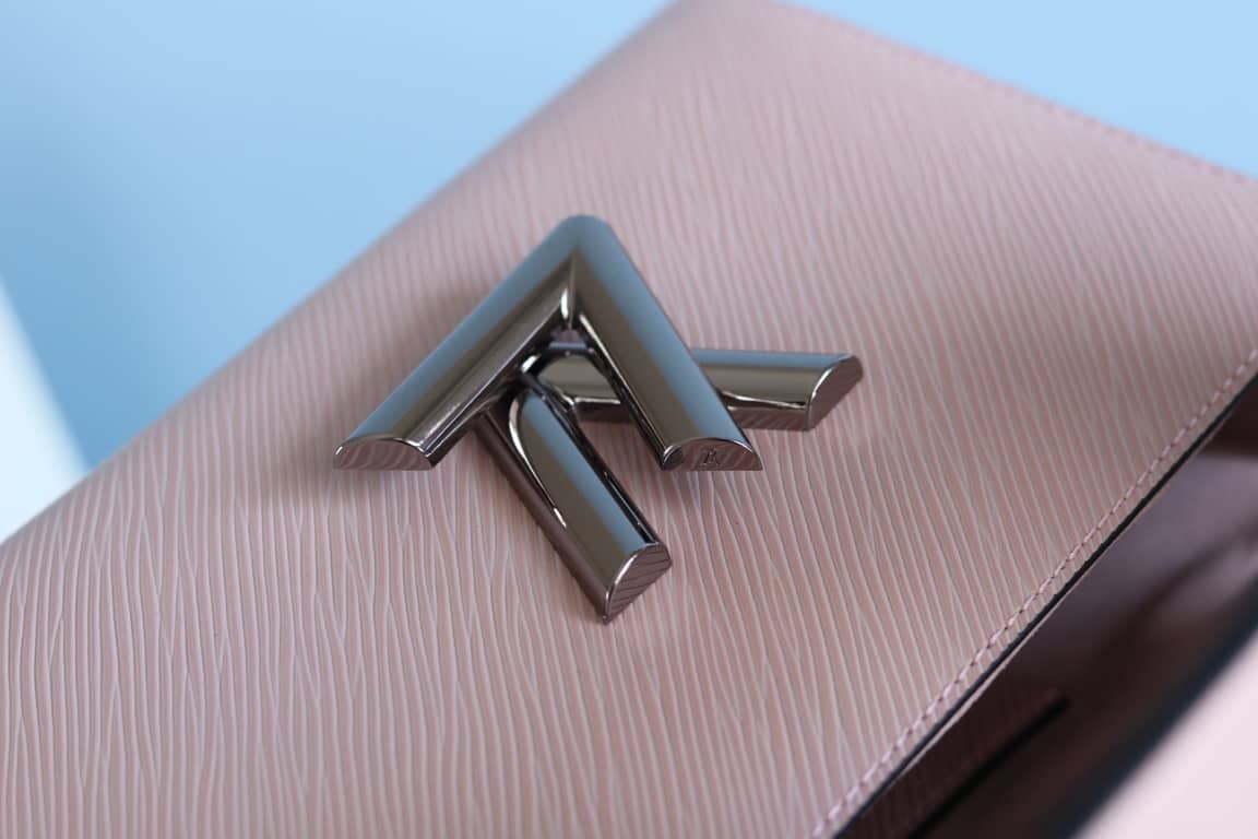 L0vis Vvtt0n Textured Epi Leather Twist Series Bag