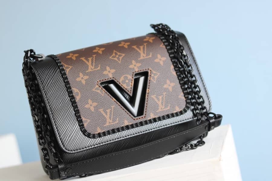 L0vis Vvtt0n Textured Epi Leather Twist Series Bag