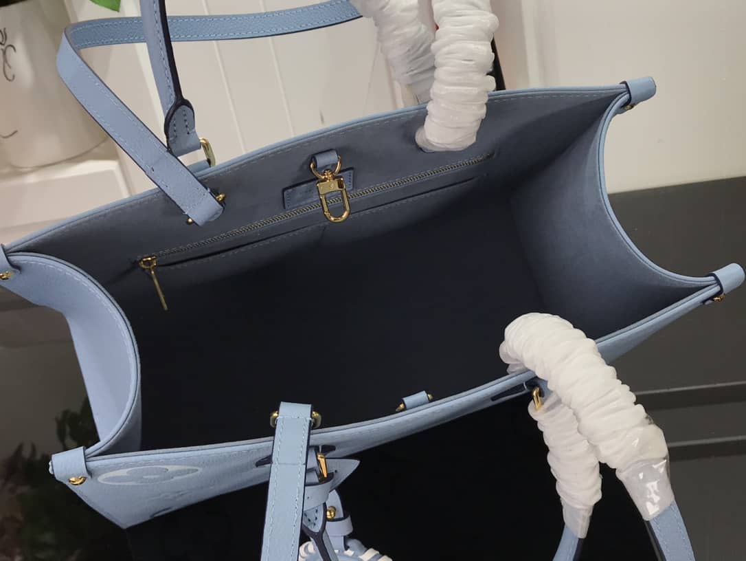 L0vis Vvtt0n On the Go MM Monogram Empreinte Two-way Tote Replica Blue M45717