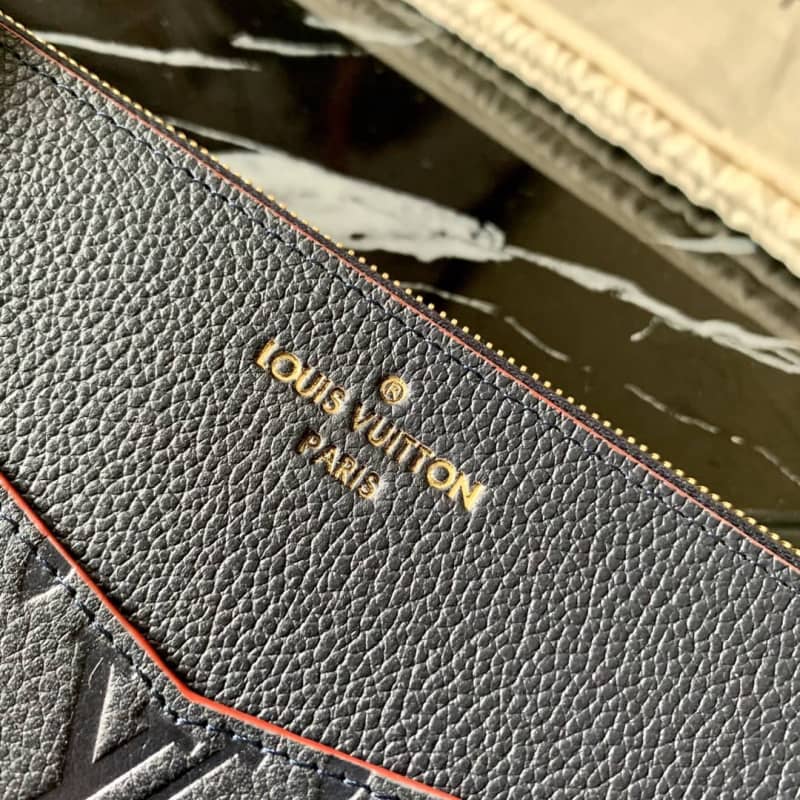 L0vis Vvtt0n Pochette Melanie MM Monogram Empreinte Replica Clutch Blue M68705