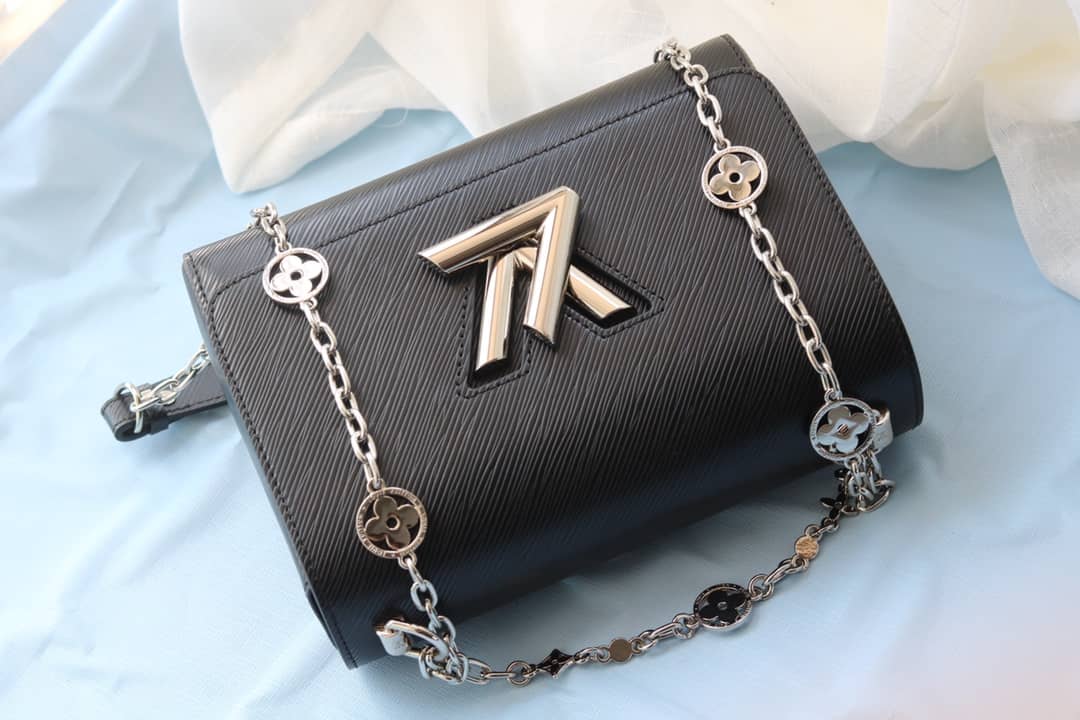 L0vis Vvtt0n Textured Epi Leather Twist Series Bag