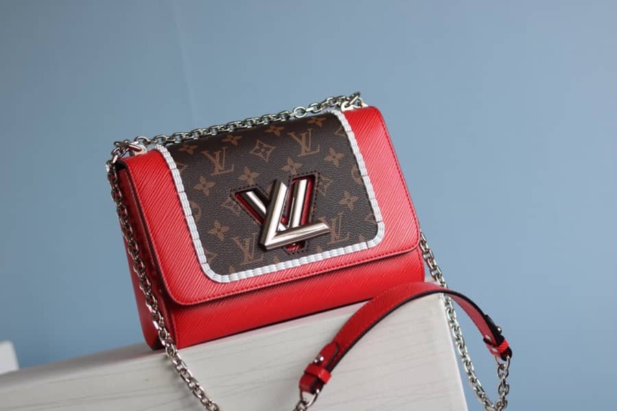 L0vis Vvtt0n Textured Epi Leather Twist Series Bag