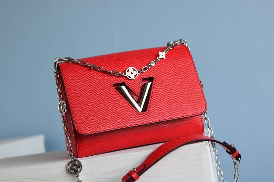 L0vis Vvtt0n Textured Epi Leather Twist Series Bag