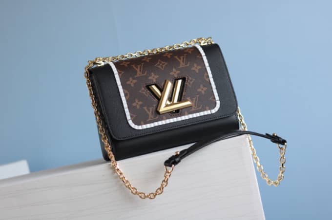 L0vis Vvtt0n Textured Epi Leather Twist Series Bag