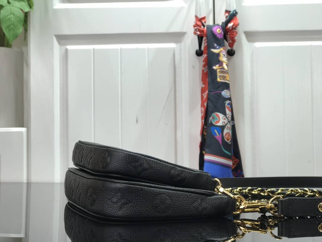 L0vis Vvtt0n Pochette Discovery Compact Replica Wallet Black M57630