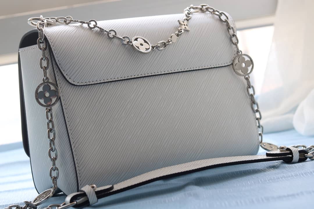 L0vis Vvtt0n Textured Epi Leather Twist Series Bag