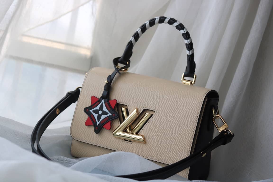 L0vis Vvtt0n Textured Epi Leather Twist Series Bag Beige