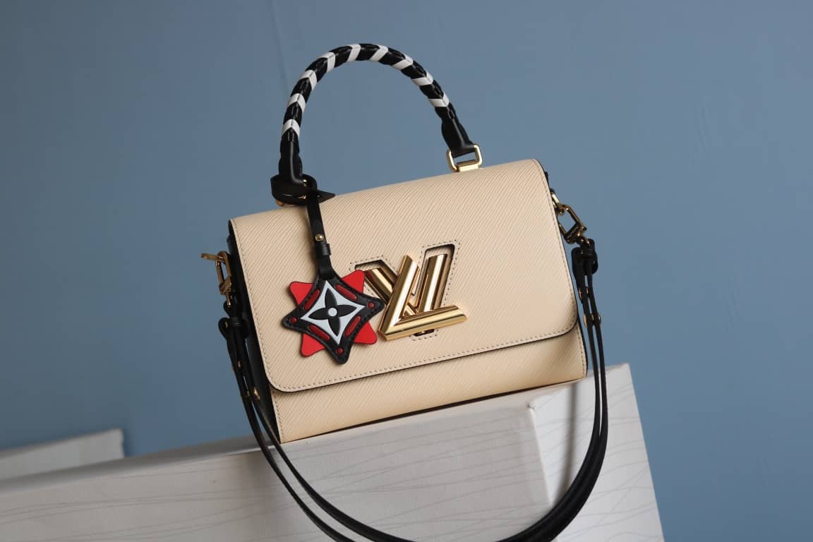 L0vis Vvtt0n Textured Epi Leather Twist Series Bag Beige