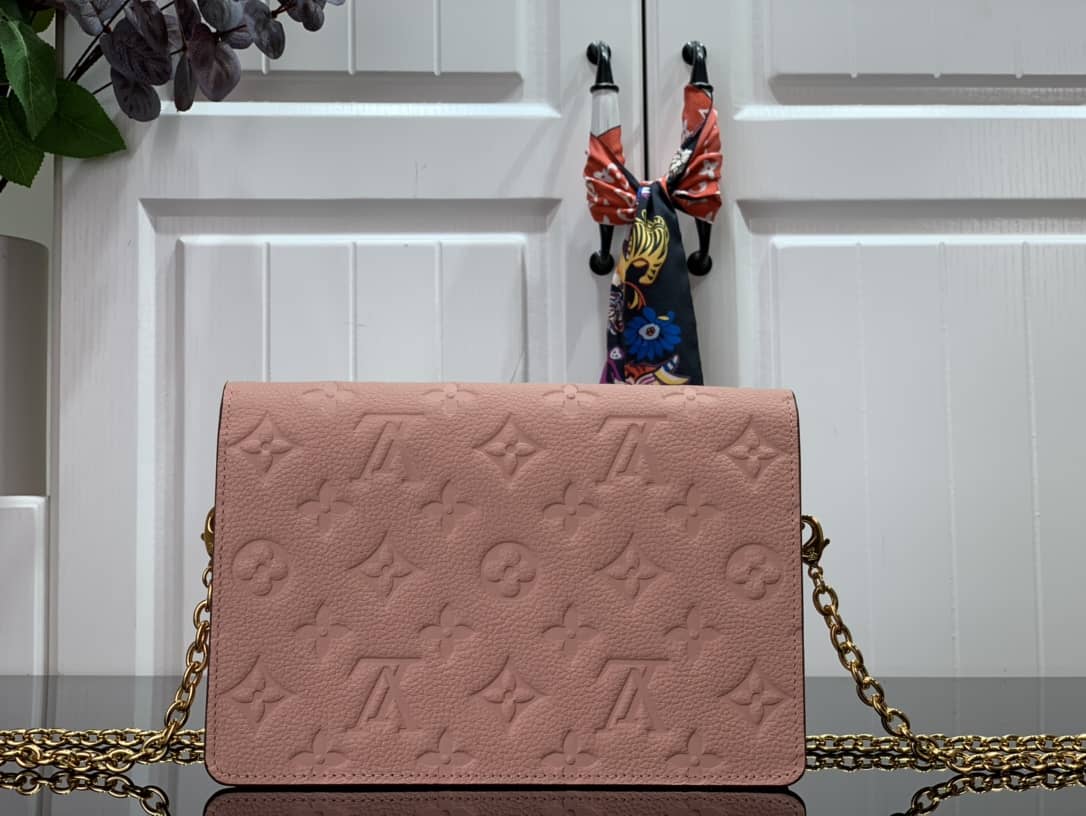 L0vis Vvtt0n Vavin Chain Empreinte Leather Replica Bag Pink M63398