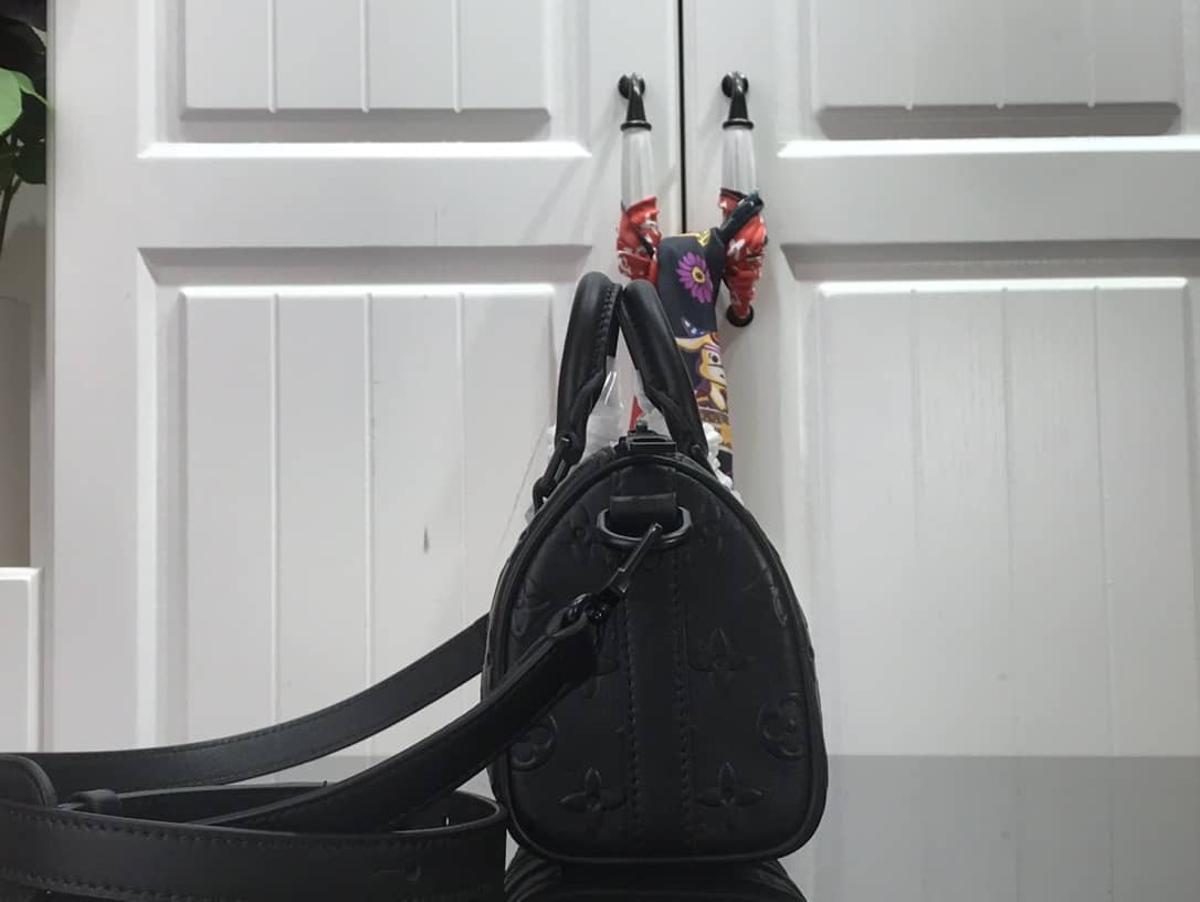 L0vis Vvtt0n Keepall XS Monogram Seal Cowhide Leather Bag Replica Black M57960