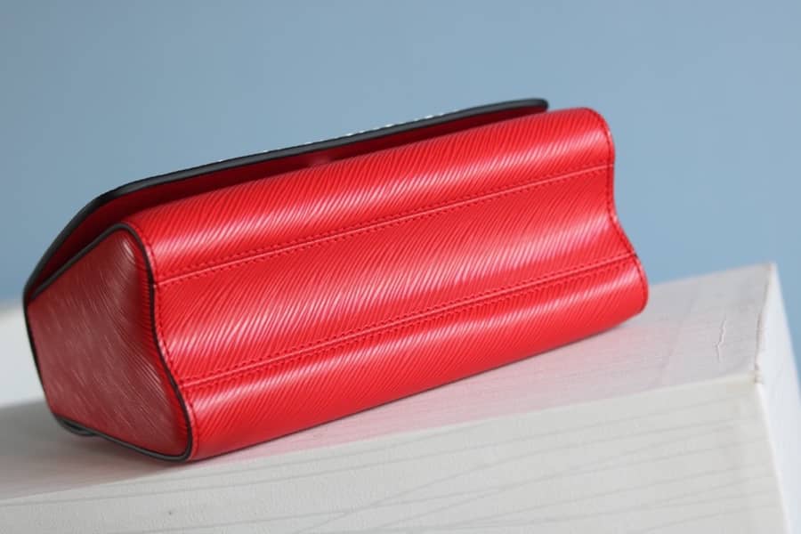 L0vis Vvtt0n Textured Epi Leather Twist Series Bag