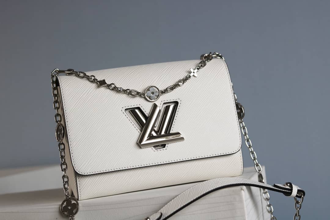 L0vis Vvtt0n Textured Epi Leather Twist Series Bag