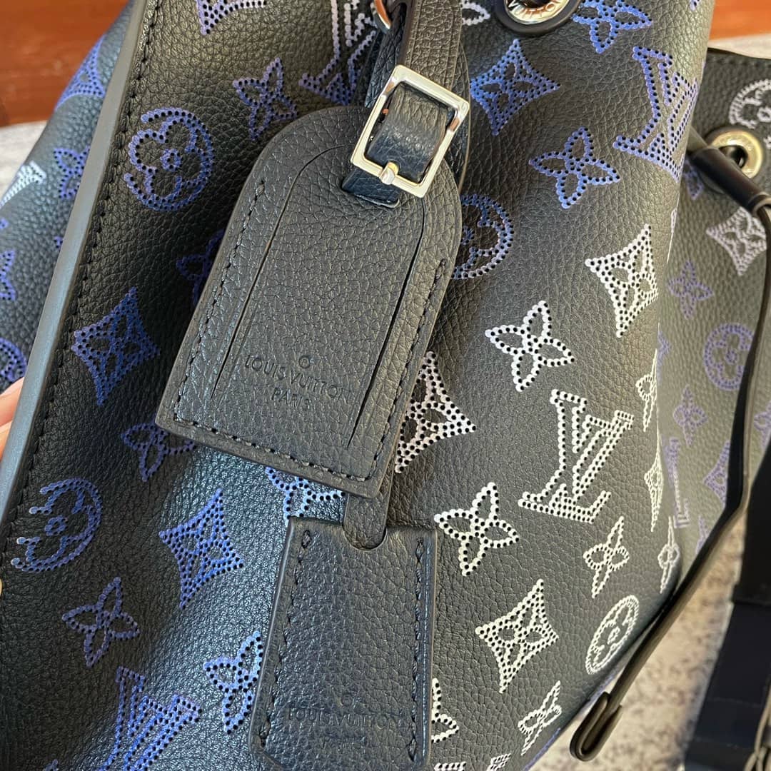 L0vis Vvtt0n Mahina Perforated Calfskin Muria Dark Blue M59554 Replica Bucket Bag