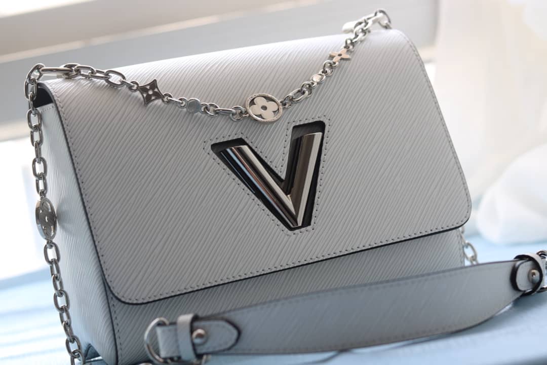 L0vis Vvtt0n Textured Epi Leather Twist Series Bag