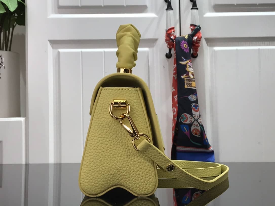 L0vis Vvtt0n Replica Bags Twist PM Pondichery Taurillon Replica Leather Bag Yellow M58691