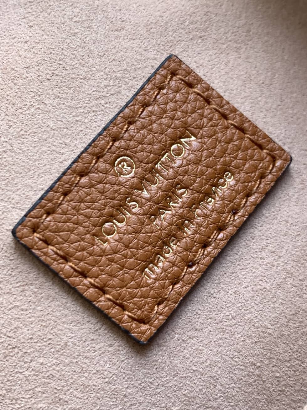 L0vis Vvtt0n Lockme Grained Calf Leather Brown M57689 Replica Bucket Bag