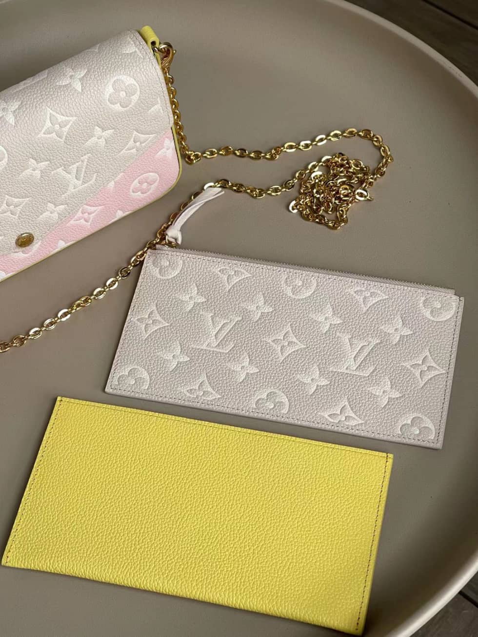 L0vis Vvtt0n Pochette Felicie Monogram Empreinte Pink Beige M81359 Replica