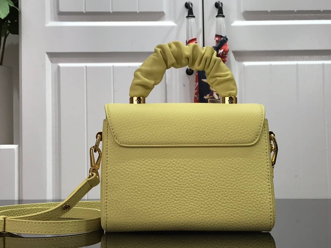 L0vis Vvtt0n Replica Bags Twist PM Pondichery Taurillon Replica Leather Bag Yellow M58691
