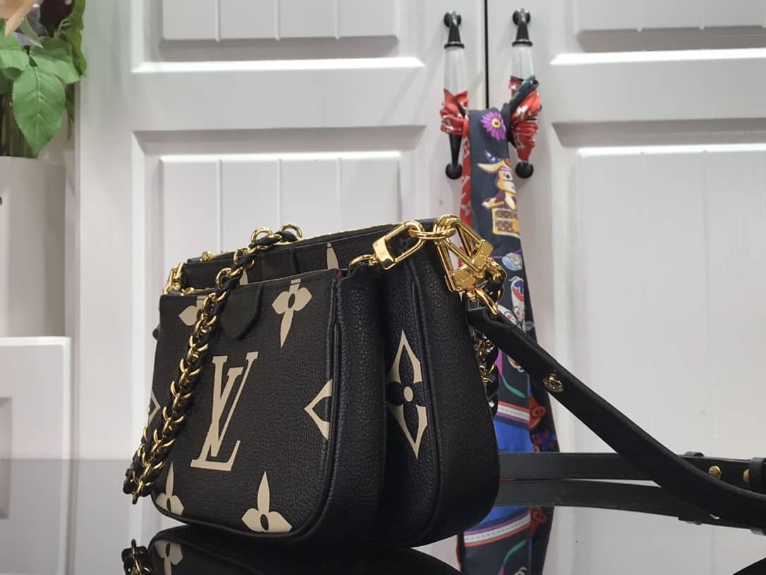 L0vis Vvtt0n Pochette Discovery Compact Replica Wallet Black M57630