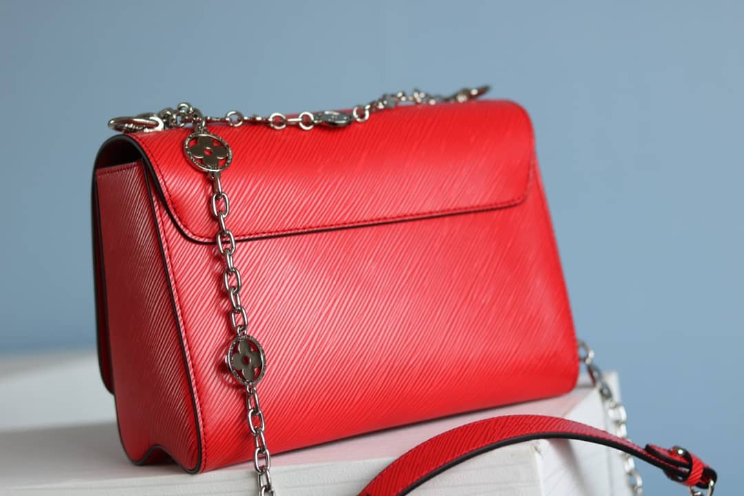 L0vis Vvtt0n Textured Epi Leather Twist Series Bag