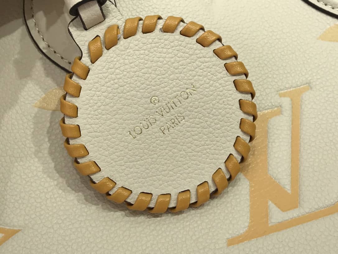 L0vis Vvtt0n On the Go MM Monogram Empreinte Two-way Tote Replica Apricot M45717