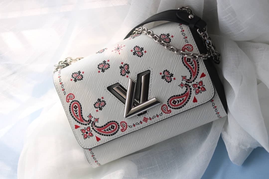 L0vis Vvtt0n Textured Epi Leather Twist Series Bag White