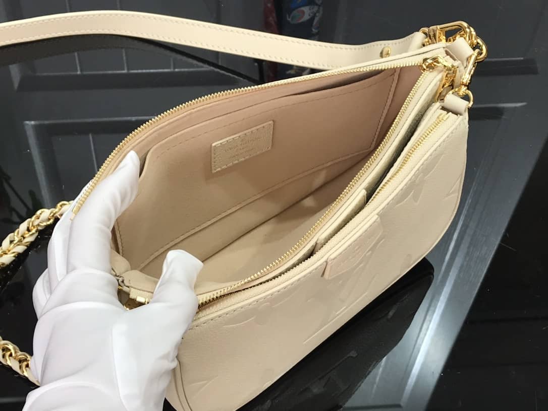 L0vis Vvtt0n Pochette Discovery Compact Replica Wallet White M57630