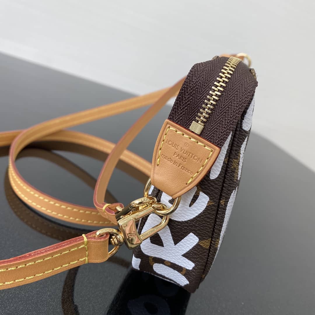 L0vis Vvtt0n Pochette Dupe 2001 Accessories Graffiti Monogram Bag M51980 White