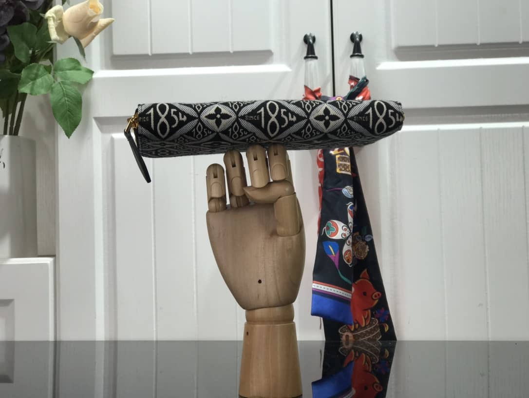 L0vis Vvtt0n Replica Since 1854 Zippy Wallet M69994