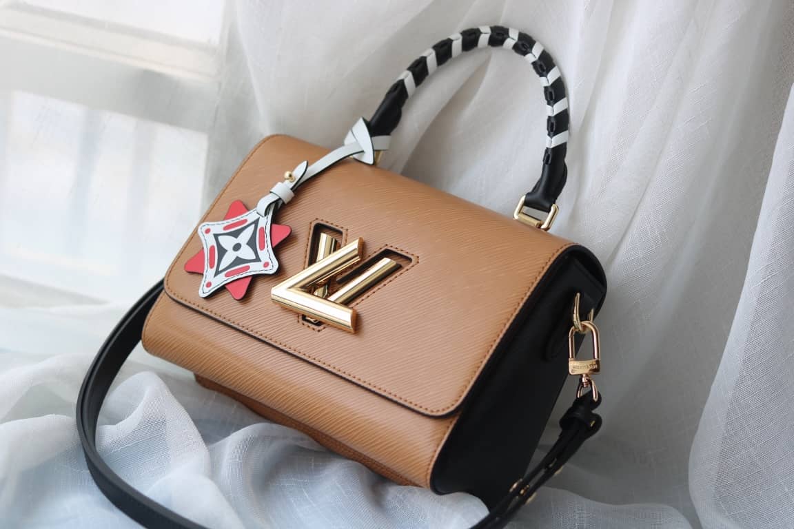 L0vis Vvtt0n Textured Epi Leather Twist Series Bag Brown