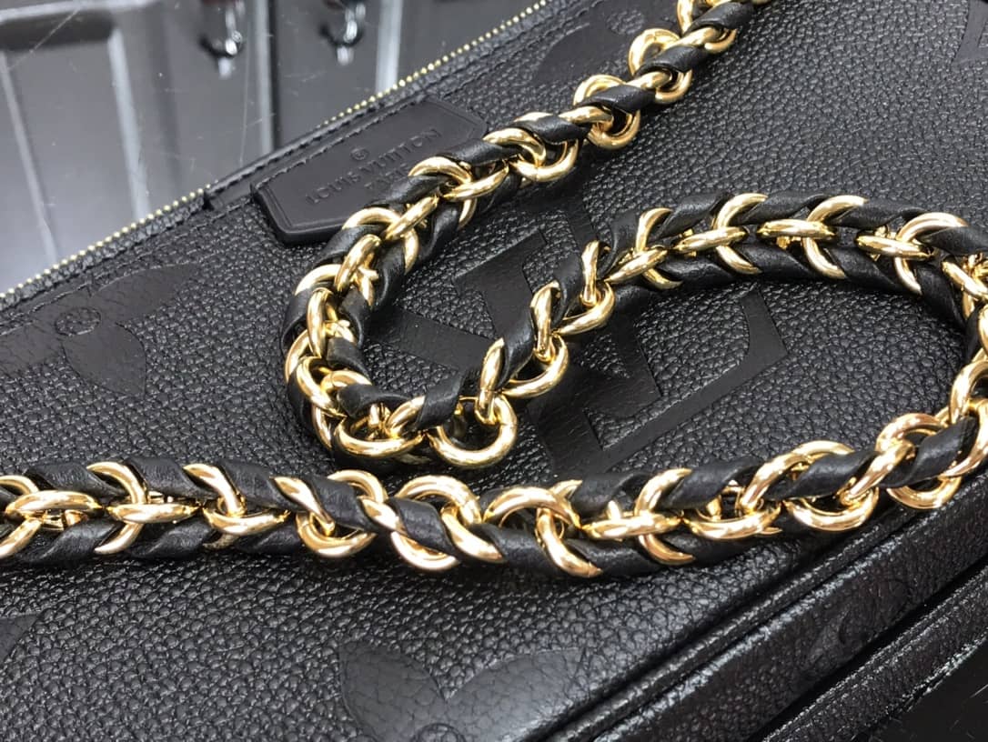 L0vis Vvtt0n Pochette Discovery Compact Replica Wallet Black M57630