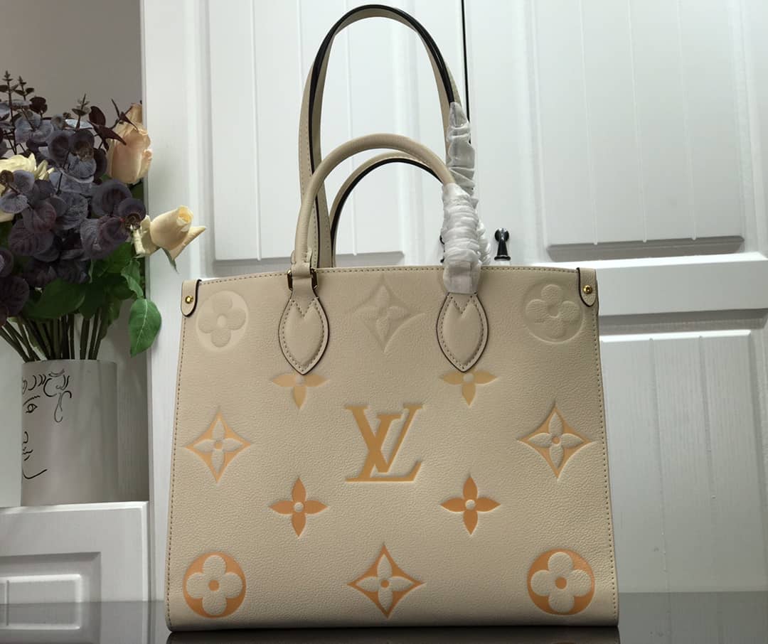 L0vis Vvtt0n On the Go MM Monogram Empreinte Two-way Tote Replica Apricot M45717