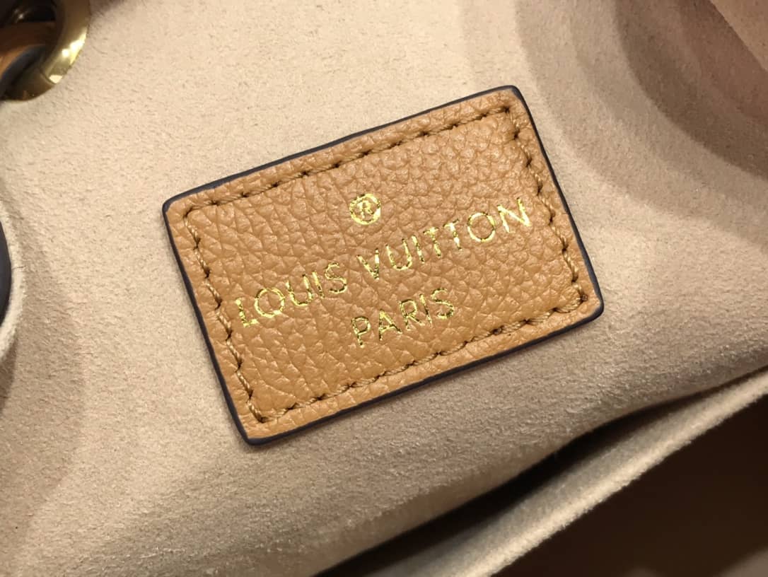 L0vis Vvtt0n Lockme Replica Bucket Bag Orange M57688