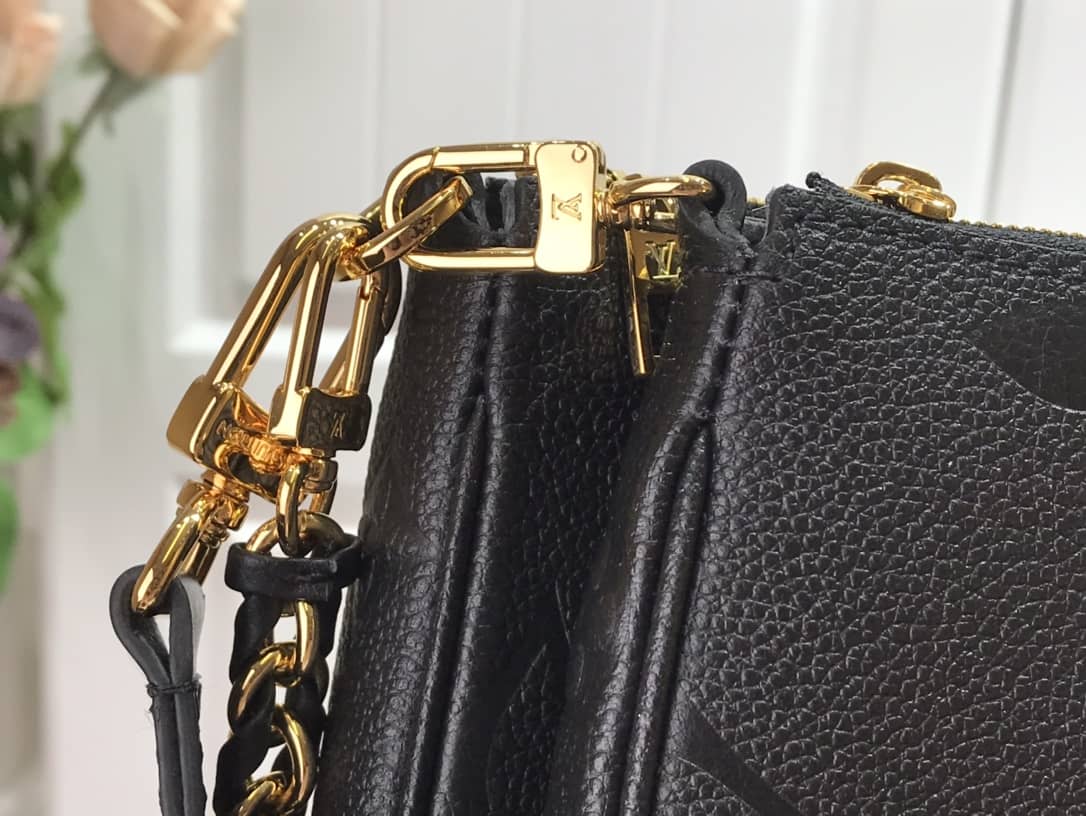 L0vis Vvtt0n Pochette Discovery Compact Replica Wallet Black M57630