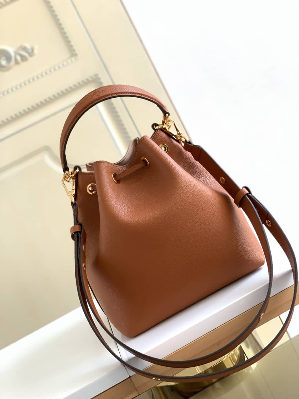 L0vis Vvtt0n Lockme Grained Calf Leather Brown M57689 Replica Bucket Bag