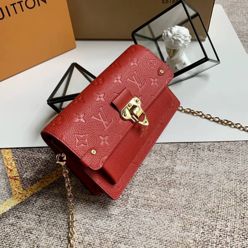 L0vis Vvtt0n Monogram Empreinte Vavin Chain Long Wallet Replica Red M67839