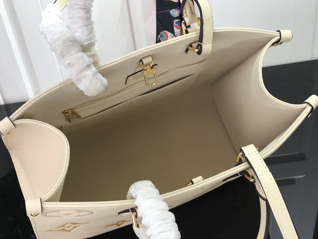 L0vis Vvtt0n On the Go MM Monogram Empreinte Two-way Tote Replica Apricot M45717