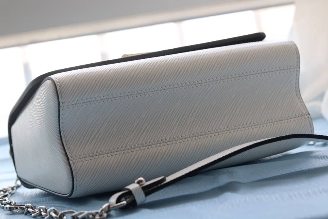 L0vis Vvtt0n Textured Epi Leather Twist Series Bag