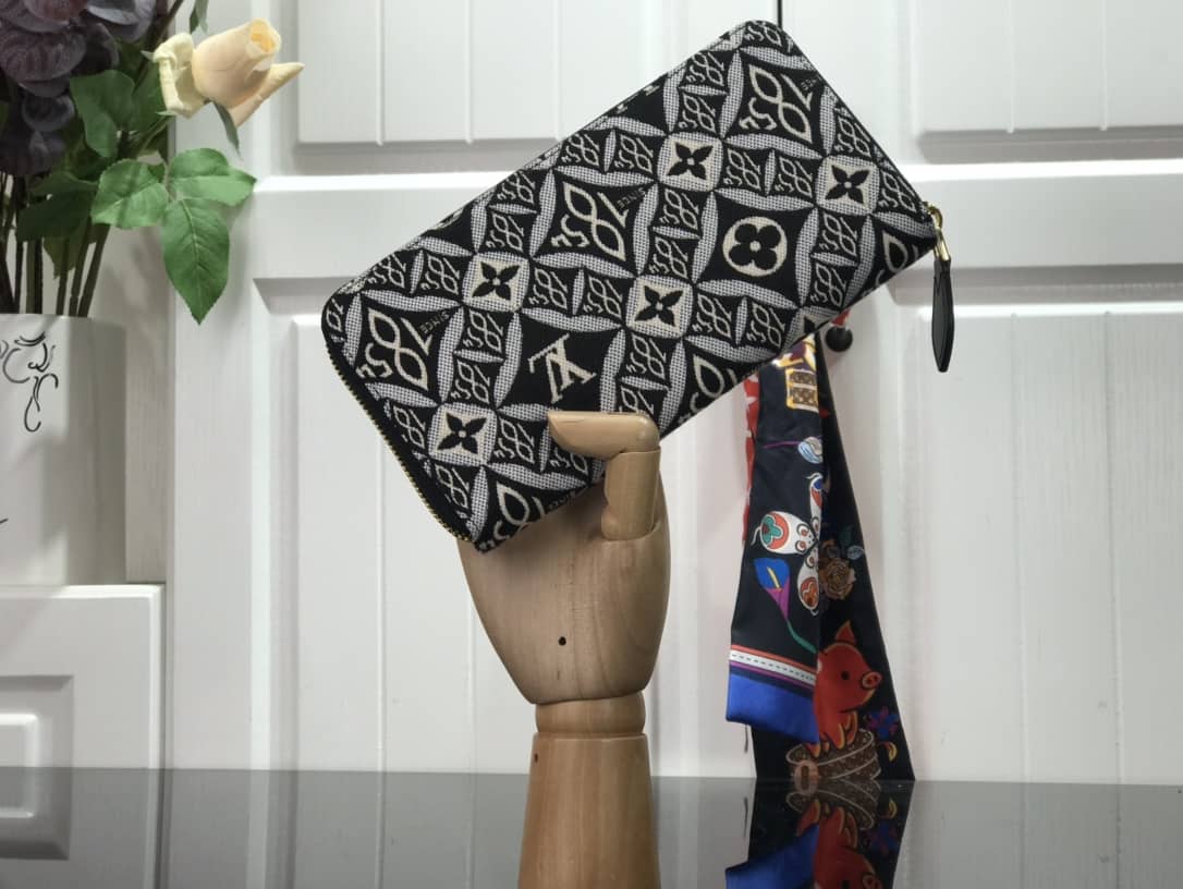 L0vis Vvtt0n Replica Since 1854 Zippy Wallet M69994