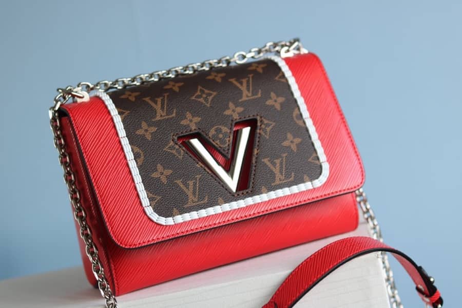 L0vis Vvtt0n Textured Epi Leather Twist Series Bag