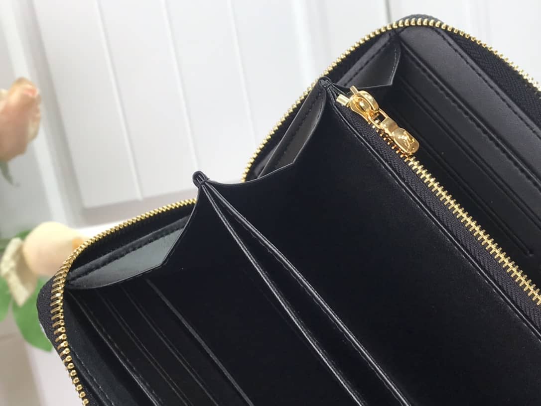 L0vis Vvtt0n Replica Since 1854 Zippy Wallet M69994