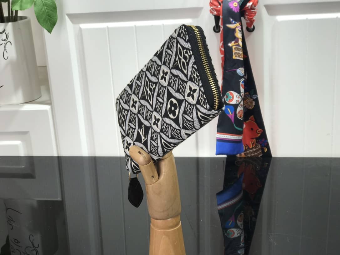 L0vis Vvtt0n Replica Since 1854 Zippy Wallet M69994