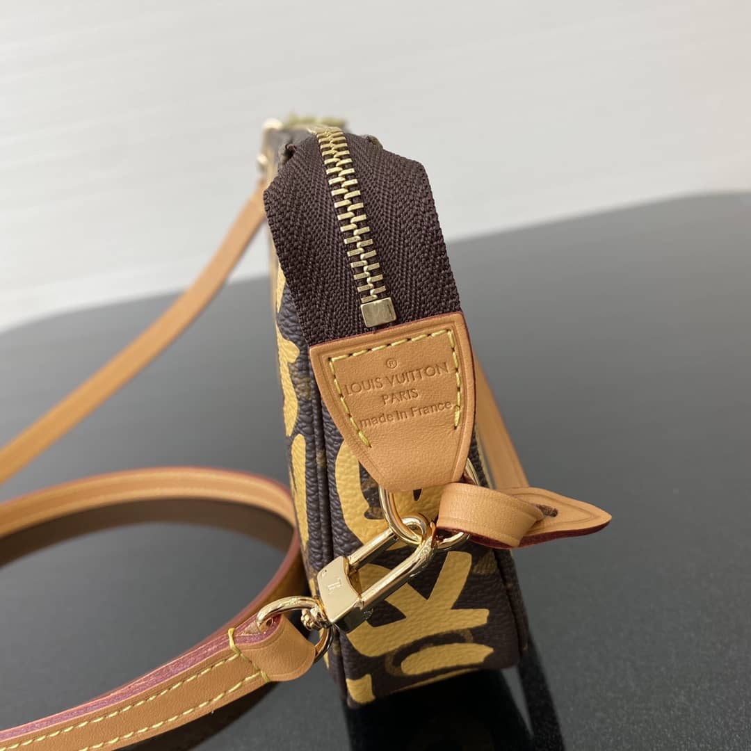 L0vis Vvtt0n Pochette Dupe 2001 Pochette Accessories Graffiti Monogram Bag M51980