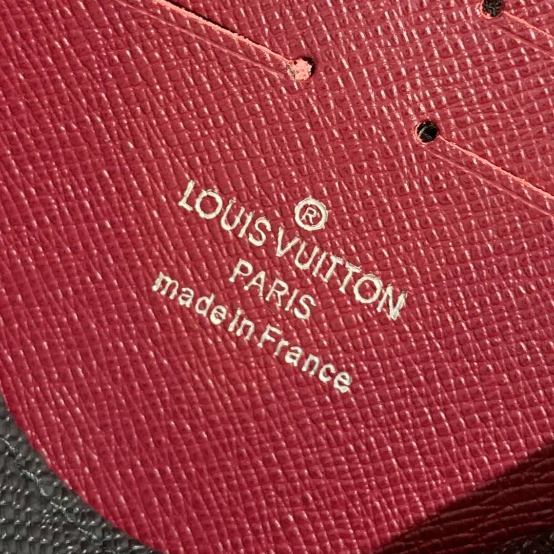 L0vis Vvtt0n Pochette Voyage MM Taiga Leather Replica Blue Red Black M30718