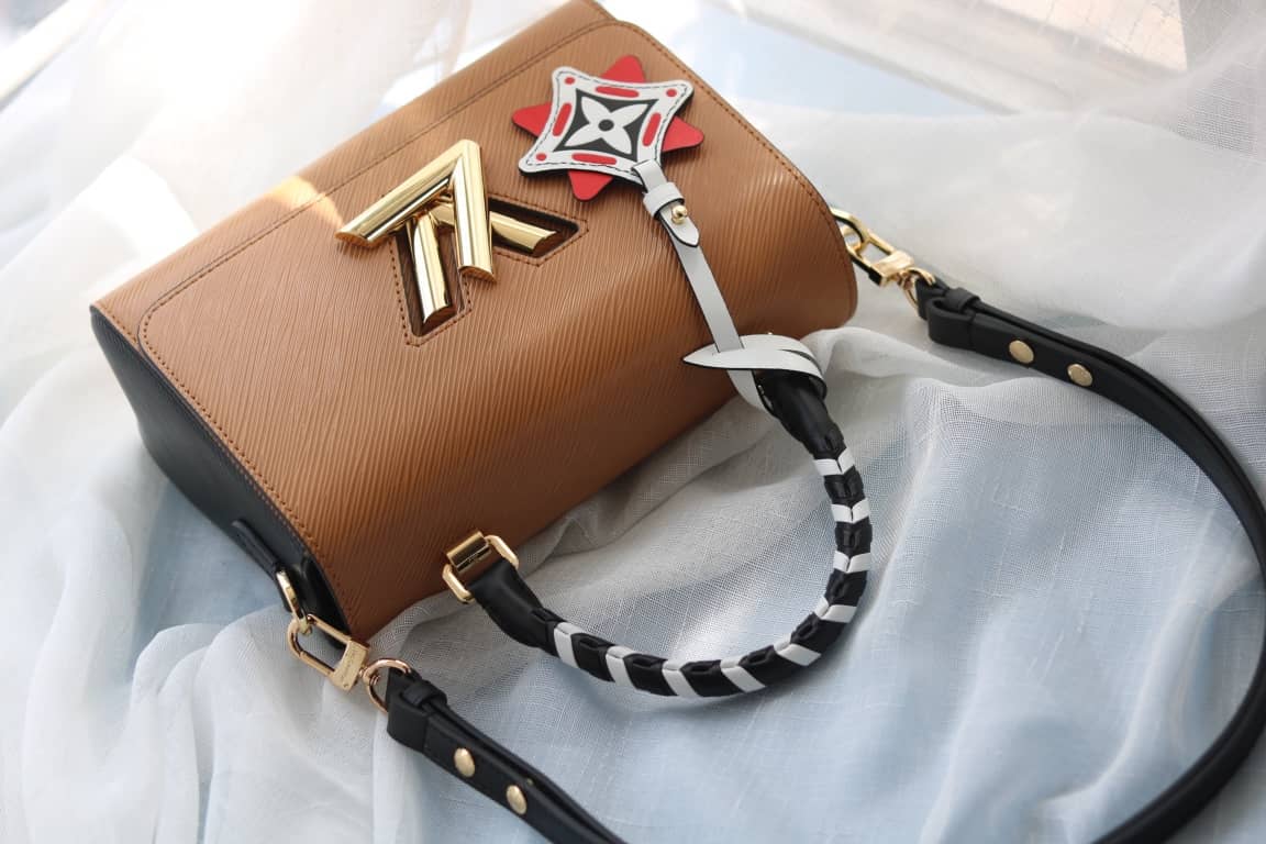 L0vis Vvtt0n Textured Epi Leather Twist Series Bag Brown